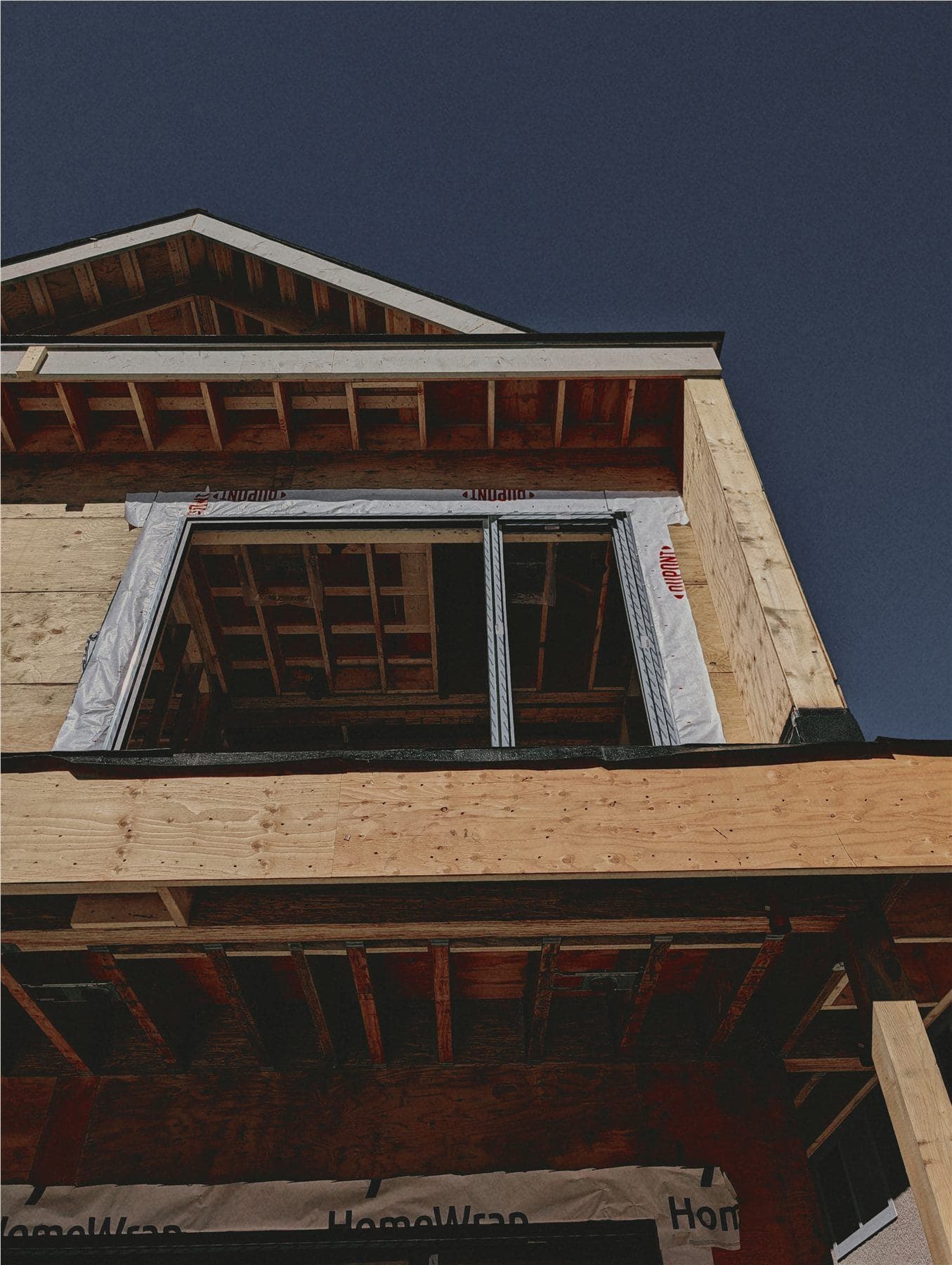 Window opening in progress on a custom residential construction site
